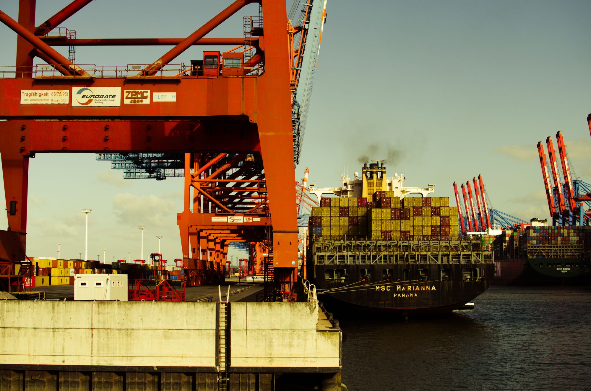 Container ship at an industrial port
