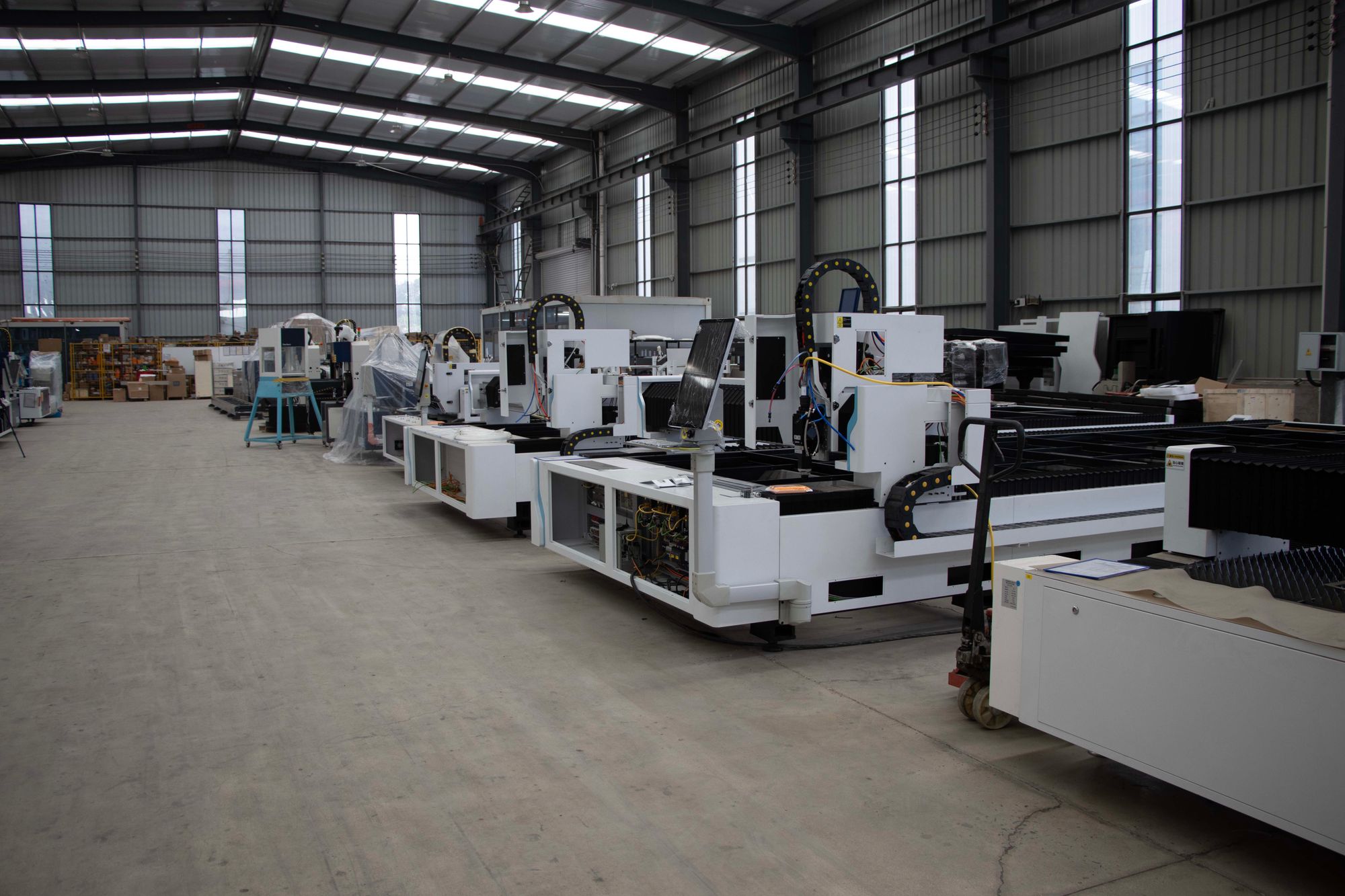 Industrial manufacturing machinery inside a warehouse