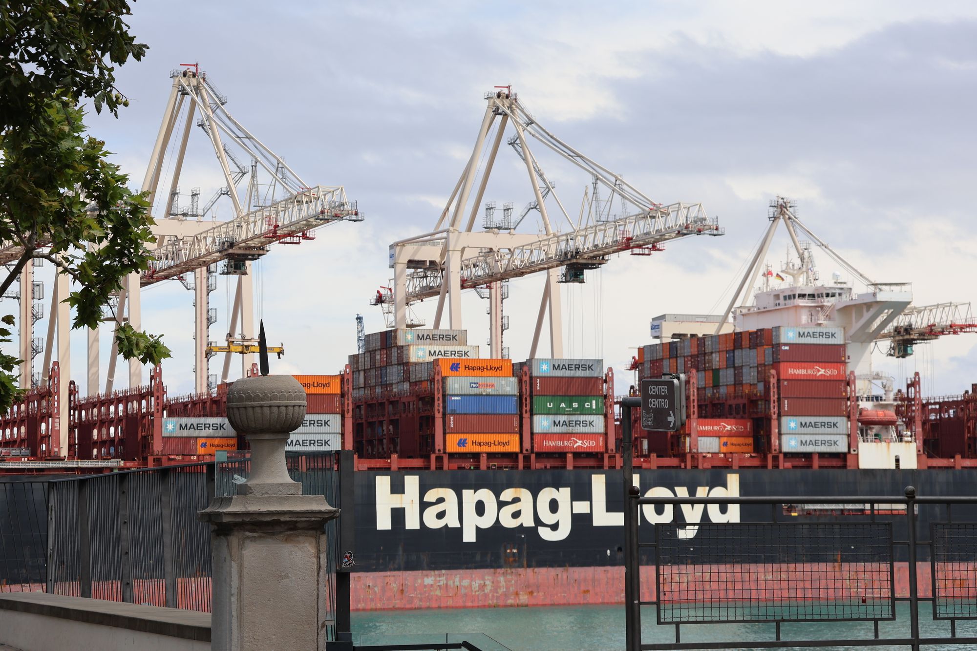 Container ship and cranes at an industrial port