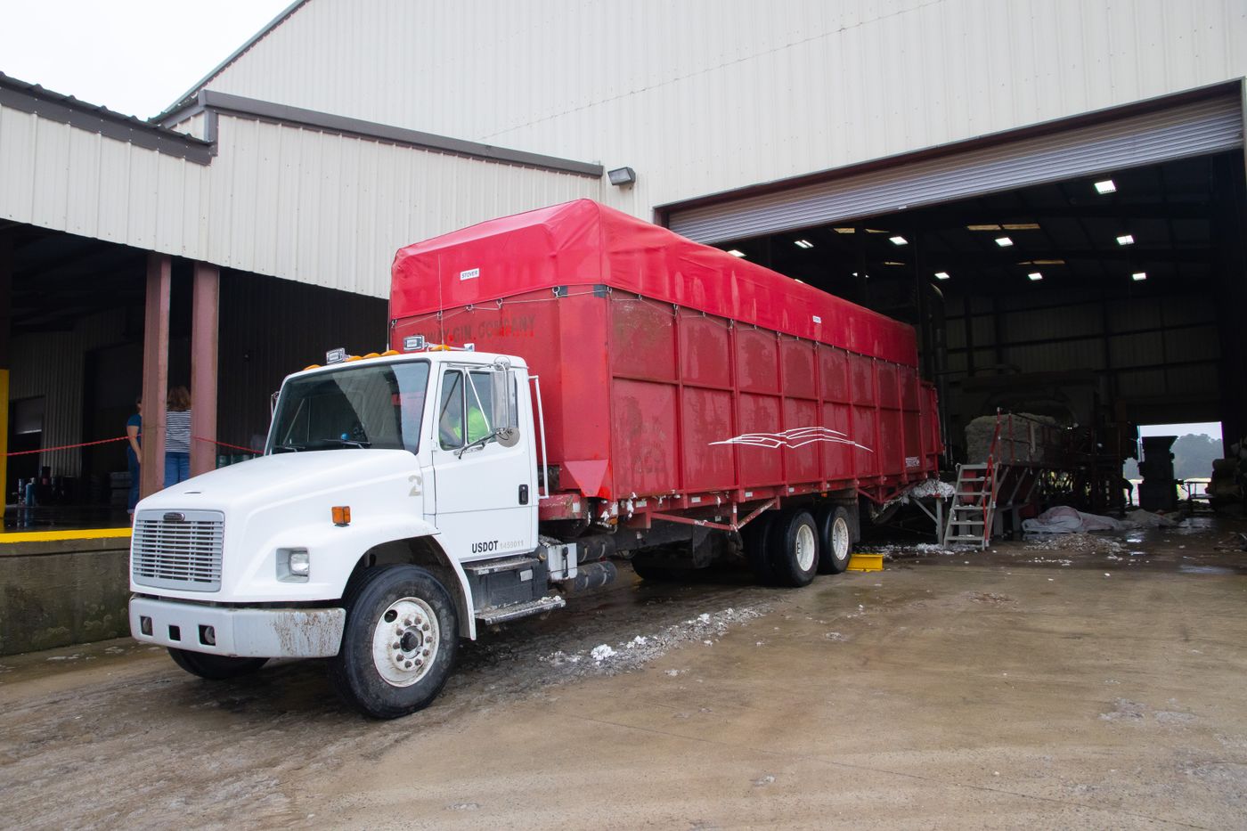 Freight trucks at a warehouse facility